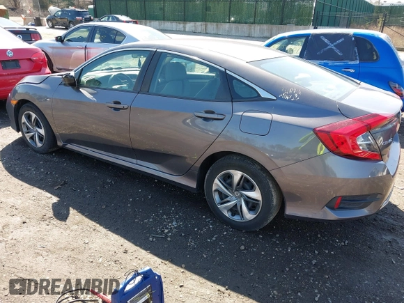 2019 Honda Civic LX with VIN 2HGFC2F66KH547041, listed as a IAAI auction lot 41984140 with 90,123 mi miles and . Bid and sale history available at DreamBid. Image 3.