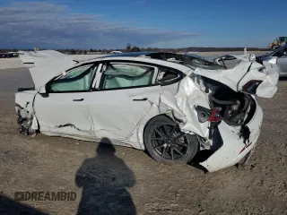 2021 Tesla Model 3 Long Range z VIN 5YJ3E1EB7MF849399, wystawiony jako Copart lot #47010175 z przebiegiem Nie podano mil oraz Szkoda całkowita • Salvage title. Historia ofert i sprzedaży dostępna na DreamBid. Obrazek 2.