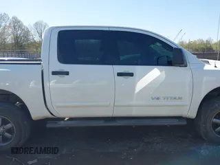 2014 Nissan Titan S with VIN 1N6AA0EC3EN502951, listed as a IAAI auction lot 41956309 with 128,464 mi miles and . Bid and sale history available at DreamBid. Image 13.