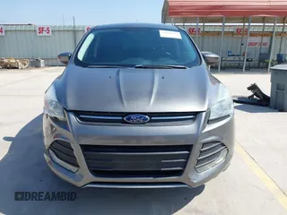 2014 Ford Escape SE with VIN 1FMCU0GX8EUD57801, listed as a IAAI auction lot 41856252 with 136,980 mi miles. Bid and sale history available at carsss.com. Image 13.