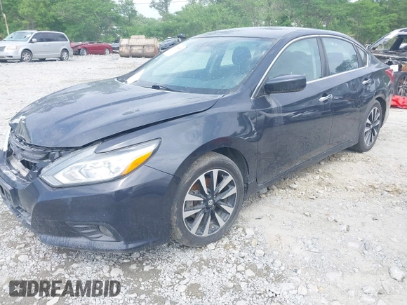 2018 Nissan Altima SV with VIN 1N4AL3AP8JC237981, listed as a IAAI auction lot 42178985 with 217,534 mi miles and . Bid and sale history available at DreamBid. Image 2.