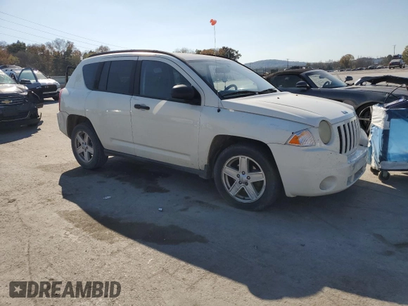 2007 Jeep Compass Sport with VIN 1J8FT47047D418703, listed as a Copart auction lot 77315704 with 159,932 mi miles and Salvage Title. Bid and sale history available at carsss.com. Image 4.