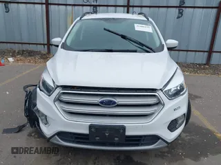 2018 Ford Escape SE z VIN 1FMCU9GD0JUC62783, wystawiony jako IAAI lot #41488153 z przebiegiem 55 774 mil mil oraz . Historia ofert i sprzedaży dostępna na DreamBid. Obrazek 12.