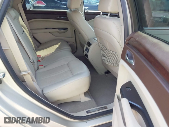 2015 Cadillac SRX Premium Collection with VIN 3GYFNDE38FS561936, listed as a IAAI auction lot 42266801 with 64,820 mi miles and . Bid and sale history available at DreamBid. Image 8.