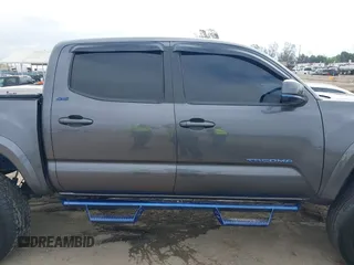 2018 Toyota Tacoma SR5 with VIN 5TFAZ5CNXJX066952, listed as a IAAI auction lot 41894562 with 141,818 mi miles and . Bid and sale history available at DreamBid. Image 13.