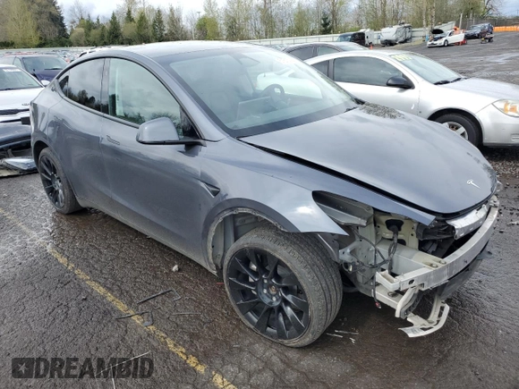 2023 Tesla Model Y Long Range z VIN 7SAYGDEE1PF937867, wystawiony jako Copart lot #51615195 z przebiegiem 88 912 mil mil oraz Szkoda całkowita • Salvage title. Historia ofert i sprzedaży dostępna na DreamBid. Obrazek 4.