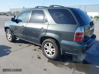 2006 Acura MDX Touring with VIN 2HNYD18726H533142, listed as a IAAI auction lot 42007839 with 216,910 mi miles. Bid and sale history available at carsss.com. Image 3.