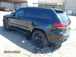 2020 Jeep Grand Cherokee Trackhawk with VIN 1C4RJFN96LC336561, listed as a IAAI auction lot 41991800 with 58,781 mi miles and . Bid and sale history available at DreamBid. Image 3.