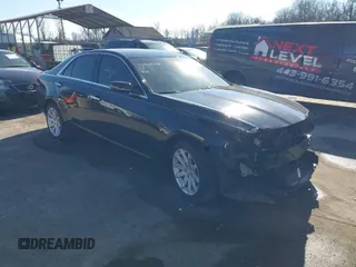 2016 Cadillac CTS AWD with VIN 1G6AW5SX8G0198009, listed as a IAAI auction lot 41437238 with 54,882 mi miles and . Bid and sale history available at DreamBid. Image 1.