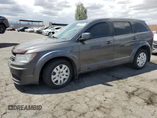 2014 Dodge Journey American Value Pkg with VIN 3C4PDCAB8ET256983, listed as a Copart auction lot 54976545 with 184,764 mi miles and Clean Title. Bid and sale history available at carsss.com. Image 1.