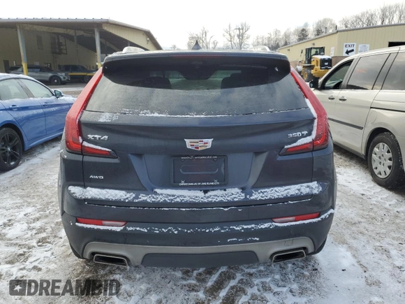 2022 Cadillac XT4 AWD Premium Luxury with VIN 1GYFZDR42NF140322, listed as a Copart auction lot 89084545 with 32,440 mi miles and Salvage Title. Bid and sale history available at carsss.com. Image 6.
