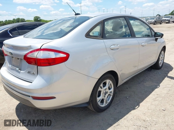 2016 Ford Fiesta SE with VIN 3FADP4BJ4GM101162, listed as a IAAI auction lot 42240414 with 216,099 mi miles and . Bid and sale history available at DreamBid. Image 4.