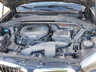 2018 BMW X1 xDrive28i with VIN WBXHT3C33J5F90349, listed as a IAAI auction lot 41385063 with 55,994 mi miles. Bid and sale history available at carsss.com. Image 10.