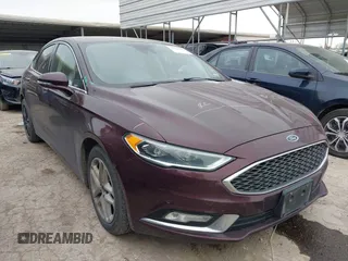 2017 Ford Fusion Titanium with VIN 3FA6P0K98HR187605, listed as a IAAI auction lot 41322460 with 103,608 mi miles. Bid and sale history available at carsss.com. Image 1.