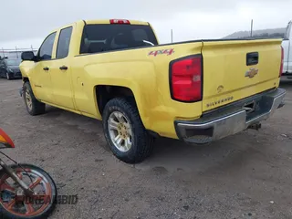 2014 Chevrolet Silverado 1500 LT with VIN 1GCVKREC5EZ247766, listed as a IAAI auction lot 40988625 with 203,672 mi miles and . Bid and sale history available at DreamBid. Image 3.