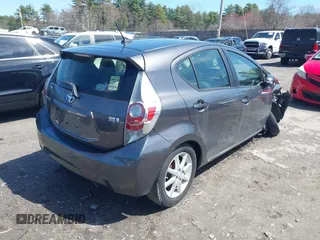 2014 Toyota Prius One z VIN JTDKDTB32E1070932, wystawiony jako IAAI lot #41950966 z przebiegiem 93 952 mil mil oraz . Historia ofert i sprzedaży dostępna na DreamBid. Obrazek 4.