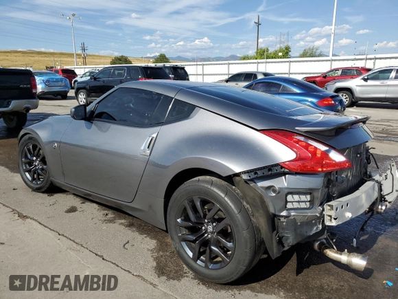 2015 Nissan 370Z with VIN JN1AZ4EH2FM444159, listed as a Copart auction lot 71005944 with 54,063 mi miles and Salvage Title. Bid and sale history available at carsss.com. Image 2.