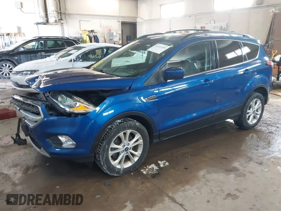 2018 Ford Escape SE z VIN 1FMCU9GD1JUB80500, wystawiony jako IAAI lot #41613294 z przebiegiem 112 187 mil mil oraz . Historia ofert i sprzedaży dostępna na DreamBid. Obrazek 17.