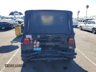 2005 Jeep Wrangler Rubicon with VIN 1J4FA69SX5P343826, listed as a Copart auction lot 69074374 with 179,610 mi miles and Salvage Title. Bid and sale history available at carsss.com. Image 6.