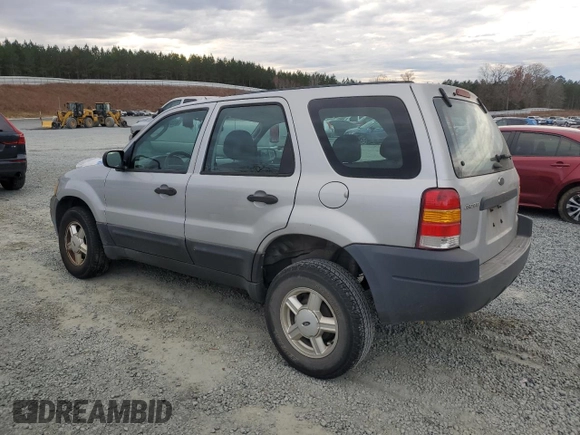 2004 Ford Escape with VIN 1FMCU02144KB63439, listed as a Copart auction lot 85310514 with 275,625 mi miles and Salvage title. Bid and sale history available at DreamBid. Image 2.