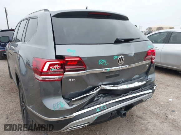 2020 Volkswagen Atlas SEL with VIN 1V2ER2CA6LC505201, listed as a IAAI auction lot 41335878 with 30,732 mi miles and . Bid and sale history available at DreamBid. Image 6.
