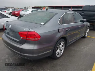 2013 Volkswagen Passat SE with VIN 1VWBN7A34DC148052, listed as a IAAI auction lot 42423919 with 83,634 mi miles and . Bid and sale history available at DreamBid. Image 4.