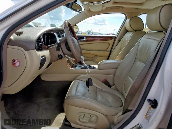 2006 Jaguar XJ Vanden Plas with VIN SAJWA82B16SH06996, listed as a Copart auction lot 62509025 with 80,236 mi miles and Salvage title. Bid and sale history available at DreamBid. Image 7.