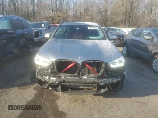 2021 BMW X3 M with VIN 5YMTS0C08M9F26343, listed as a Copart auction lot 88410035 with 52,596 mi miles and Salvage Title. Bid and sale history available at carsss.com. Image 5.