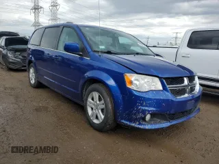 2013 Dodge Grand Caravan Crew with VIN 2C4RDGDG2DR654554, listed as a Copart auction lot 53391705 with 131,312 mi miles and Clean Title. Bid and sale history available at DreamBid. Image 4.
