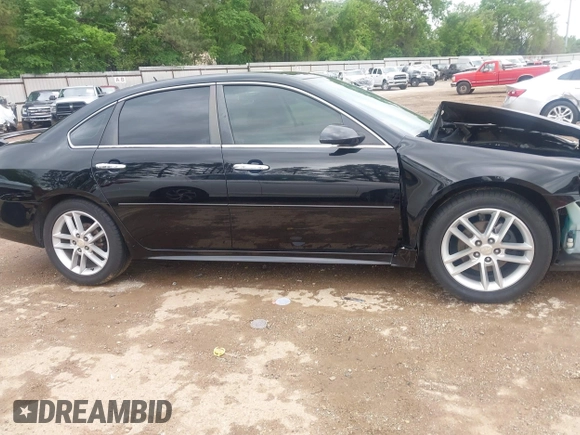 2014 Chevrolet Impala LTZ with VIN 2G1WC5E36E1138809, listed as a IAAI auction lot 41961255 with 119,222 mi miles and . Bid and sale history available at DreamBid. Image 14.