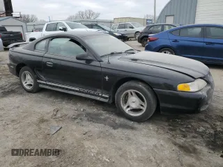 1997 Ford Mustang with VIN 1FALP4042VF198111, listed as a Copart auction lot 44245505 with 99,501 mi miles and Salvage Title. Bid and sale history available at carsss.com. Image 4.