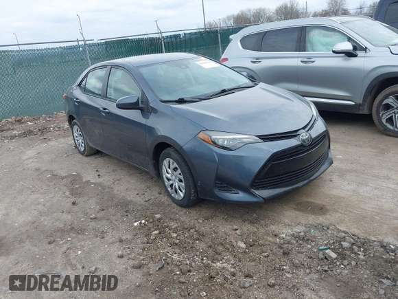 2019 Toyota Corolla L with VIN 5YFBURHE6KP934951, listed as a IAAI auction lot 42000940 with 92,794 mi miles and . Bid and sale history available at carsss.com. Image 1.