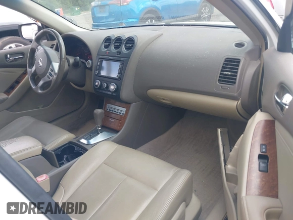 2009 Nissan Altima S z VIN 1N4AL21E39N471549, wystawiony jako IAAI lot #42203365 z przebiegiem 197 775 mil mil oraz . Historia ofert i sprzedaży dostępna na DreamBid. Obrazek 5.
