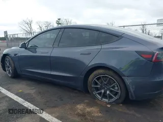2022 Tesla Model 3 Long Range with VIN 5YJ3E1EB9NF206943, listed as a IAAI auction lot 41911040 with 69,920 mi miles and . Bid and sale history available at DreamBid. Image 6.