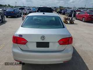 2012 Volkswagen Jetta Sedan SE w/Convenience with VIN 3VWDX7AJ1CM401939, listed as a IAAI auction lot 41941070 with 123,611 mi miles. Bid and sale history available at carsss.com. Image 16.
