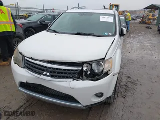 2009 Mitsubishi Outlander XLS with VIN JA4MT41X79Z012998, listed as a IAAI auction lot 41672540 with 120,058 mi miles. Bid and sale history available at carsss.com. Image 6.