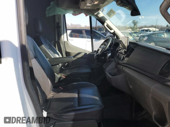2020 Ford Transit with VIN 1FTBW9CGXLKB19851, listed as a Copart auction lot 83315454 with 174,359 mi miles and Salvage title. Bid and sale history available at DreamBid. Image 7.