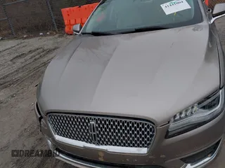 2018 Lincoln MKZ Hybrid Reserve z VIN 3LN6L5MU2JR602228, wystawiony jako IAAI lot #41441004 z przebiegiem 71 047 mil mil oraz . Historia ofert i sprzedaży dostępna na DreamBid. Obrazek 10.