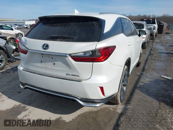 2018 Lexus RX 350L Premium z VIN JTJDZKCAXJ2005488, wystawiony jako IAAI lot #41509043 z przebiegiem 151 814 mil mil oraz . Historia ofert i sprzedaży dostępna na DreamBid. Obrazek 4.