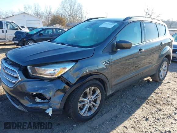 2018 Ford Escape SE with VIN 1FMCU0GD0JUA87303, listed as a IAAI auction lot 41612502 with 70,233 mi miles. Bid and sale history available at carsss.com. Image 23.