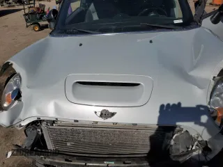 2012 MINI Convertible S z VIN WMWZP3C58CT550106, wystawiony jako Copart lot #45629035 z przebiegiem 104 851 mil mil oraz Szkoda całkowita • Salvage title. Historia ofert i sprzedaży dostępna na DreamBid. Obrazek 12.