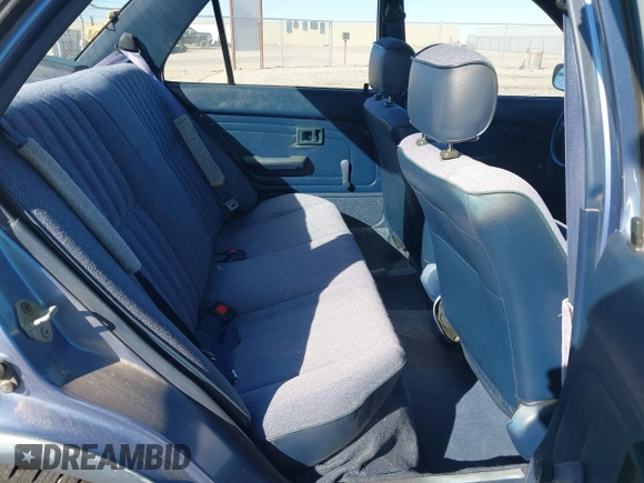 1989 Toyota Corolla with VIN JT2AE92E6K3221552, listed as a IAAI auction lot 41645601 with 634,636 mi miles and . Bid and sale history available at DreamBid. Image 8.