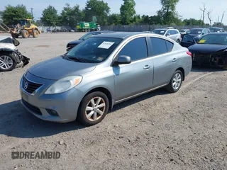 2012 Nissan Versa SV with VIN 3N1CN7AP2CL945917, listed as a IAAI auction lot 42608281 with 142,592 mi miles and . Bid and sale history available at DreamBid. Image 2.