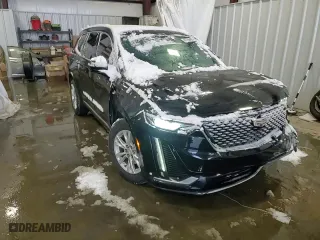 2021 Cadillac XT6 Luxury with VIN 1GYKPAR41MZ121325, listed as a Copart auction lot 87708455 with 93,270 mi miles and Salvage Title. Bid and sale history available at carsss.com. Image 11.