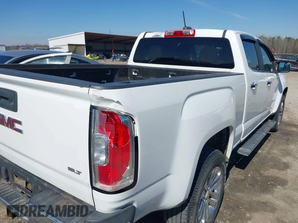 2015 GMC Canyon 2WD SLT with VIN 1GTG5CE36F1151433, listed as a IAAI auction lot 41636107 with 117,682 mi miles. Bid and sale history available at carsss.com. Image 6.