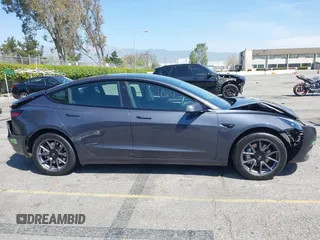 2023 Tesla Model 3 Long Range with VIN 5YJ3E1EB4PF635328, listed as a IAAI auction lot 41978099 with 32,747 mi miles and . Bid and sale history available at DreamBid. Image 13.