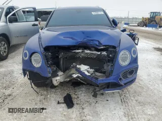 2017 Bentley Bentayga W12 z VIN SJAAC2ZV2HC014080, wystawiony jako Copart lot #44806115 z przebiegiem 63 077 mil mil oraz Szkody całkowita. Historia ofert i sprzedaży dostępna na DreamBid. Obrazek 5.