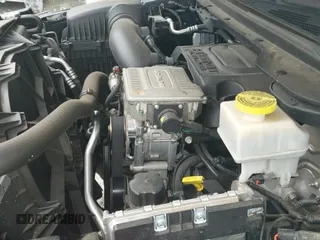 2020 Ram 1500 Rebel z VIN 1C6SRFLT0LN315399, wystawiony jako IAAI lot #42988101 z przebiegiem 93 786 mil mil oraz . Historia ofert i sprzedaży dostępna na DreamBid. Obrazek 19.