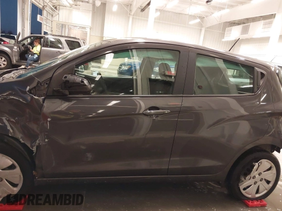 2016 Chevrolet Spark LS with VIN KL8CB6SA1GC570011, listed as a IAAI auction lot 40806037 with 106,786 mi miles. Bid and sale history available at carsss.com. Image 14.