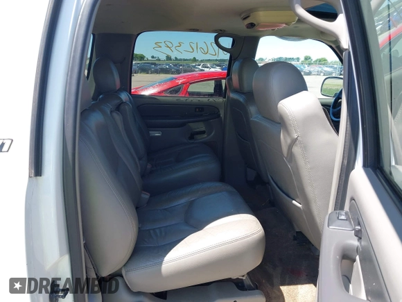 2003 Chevrolet Suburban LT z VIN 3GNFK16Z33G308805, wystawiony jako IAAI lot #42612393 z przebiegiem 205 213 mil mil oraz . Historia ofert i sprzedaży dostępna na DreamBid. Obrazek 8.